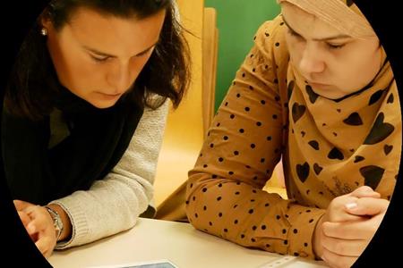 Voluntari/a per l'unitat d'escolarització compartida