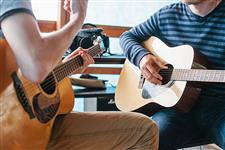 Voluntario/a para taller de guitarra